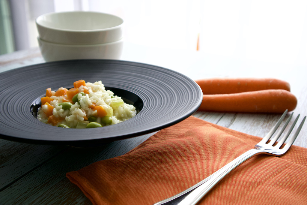Creamy risotto with edamame, carrots and celery